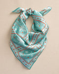 The front view of the Southern Tide Swells Illustrated Palms Scarf by Southern Tide - Teal