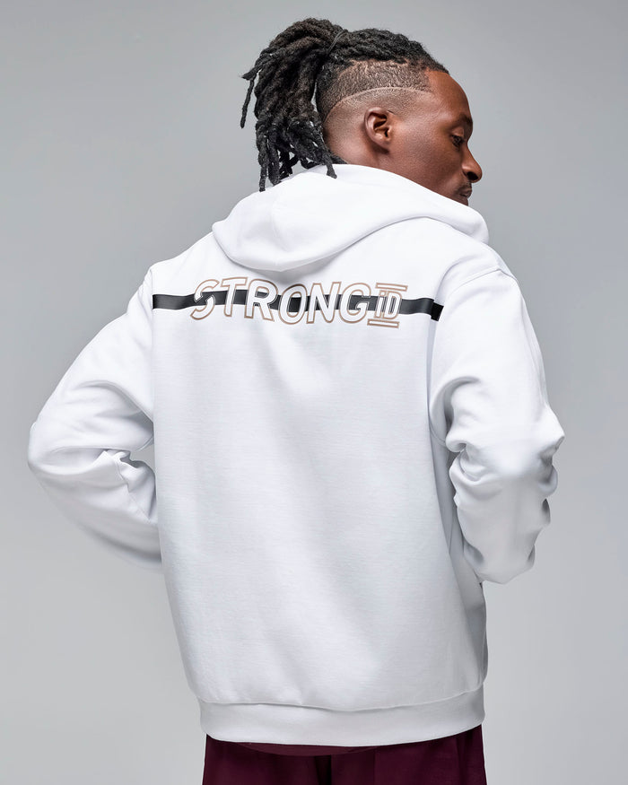 Back view of a white zip-up hoodie with a hood and large “STRONG iD” graphic across the upper back. Male model wears the long-sleeve hoodie with burgundy athletic shorts against a light gray background.