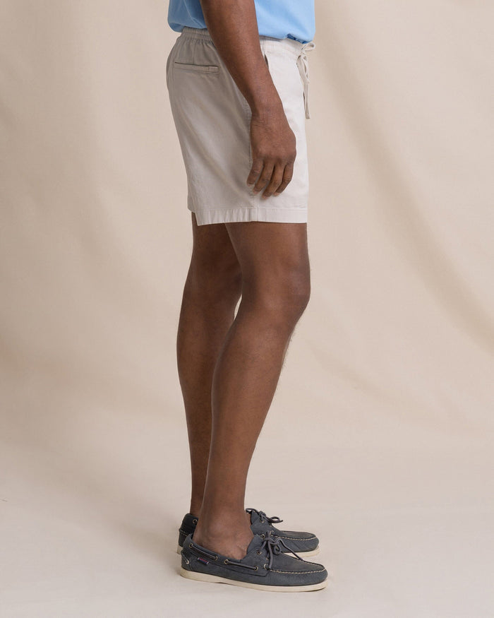 The side view of the Southern Tide Surf Rider Short by Southern Tide - Stone