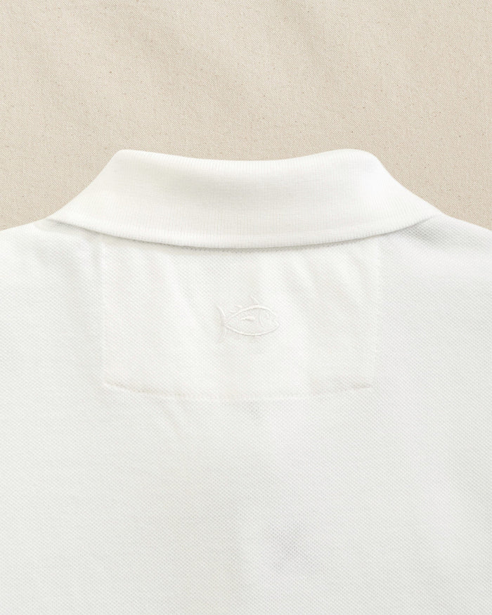 The detail view of the Southern Tide TCU Horned Frogs Skipjack Polo by Southern Tide - Classic White