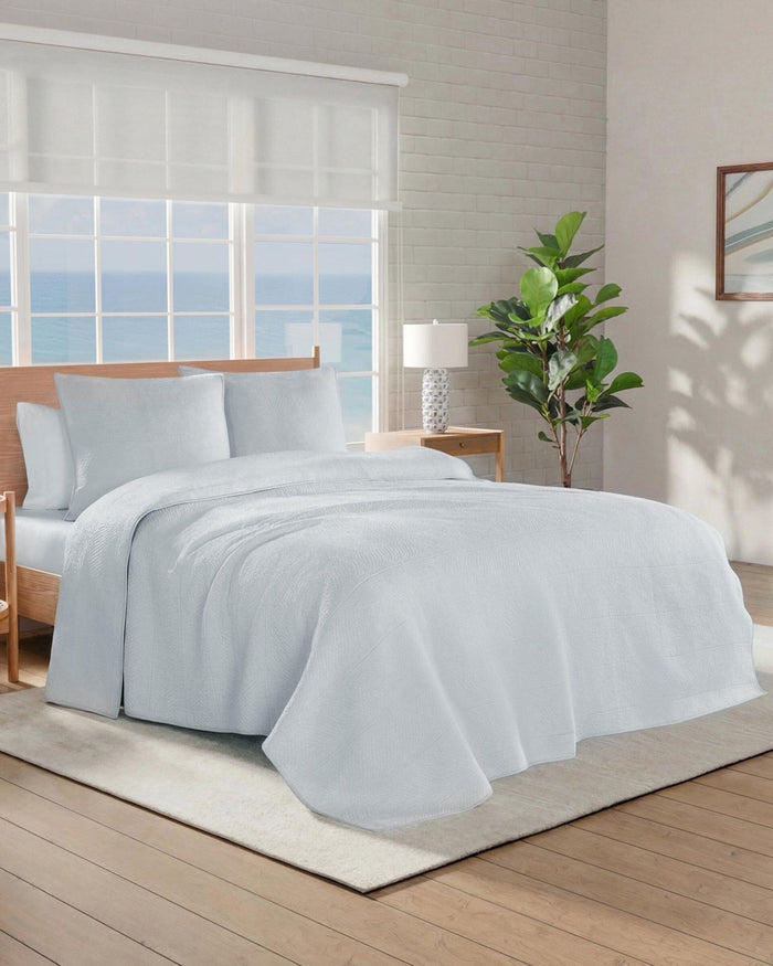 The side view of the Southern Tide Tideline Coverlet Quilt by Southern Tide - Grey