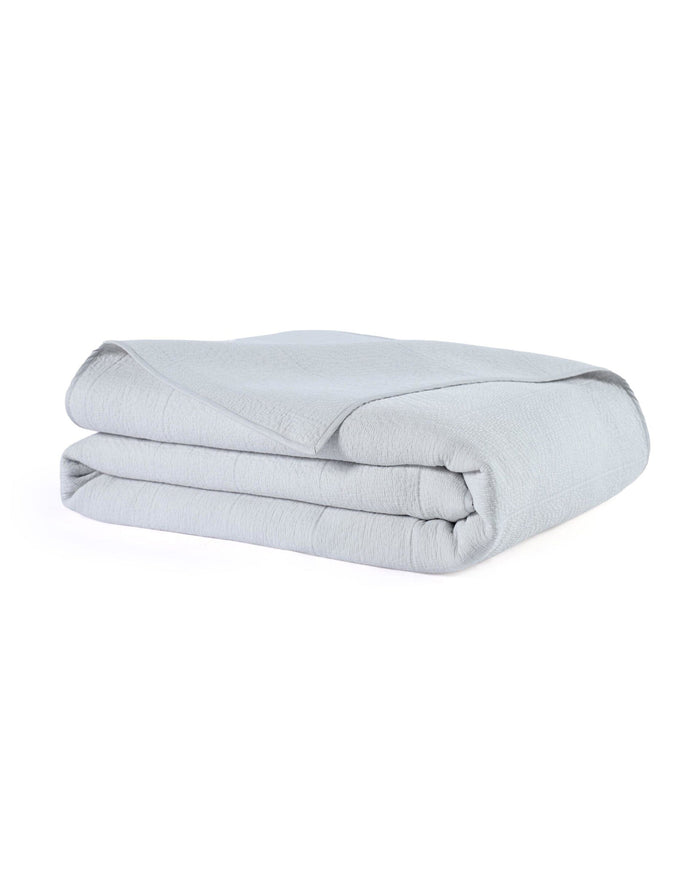 The front view of the Southern Tide Tideline Coverlet Quilt by Southern Tide - Grey
