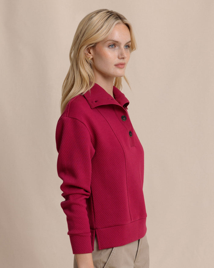 The side view of the Southern Tide Tonya Button Mock Pullover by Southern Tide - Carolina Plum