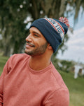 The lifestyle view of the Southern Tide Trailhead Beanie by Southern Tide - True Navy