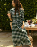 The lifestyle view of the Southern Tide Trista Gordan Tartan Shirt Dress by Southern Tide - Salt Meadow