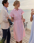 The lifestyle view of the Southern Tide Tyra Striped Ruffle Sleeve Midi Dress by Southern Tide - Sea Pink