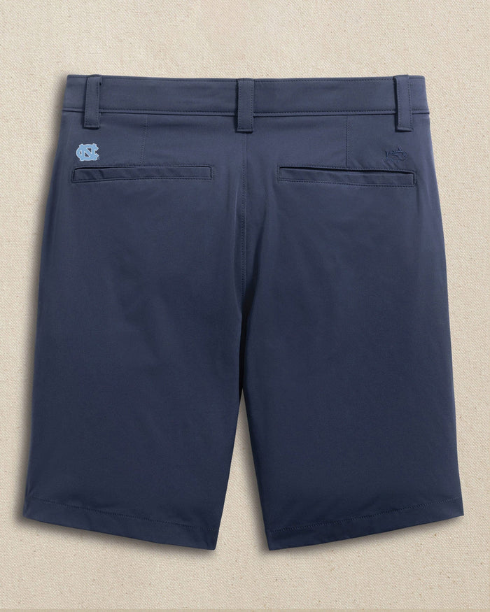 The back view of the Southern Tide UNC Tar Heels brrr°®-die 8" Performance Short by Southern Tide - True Navy