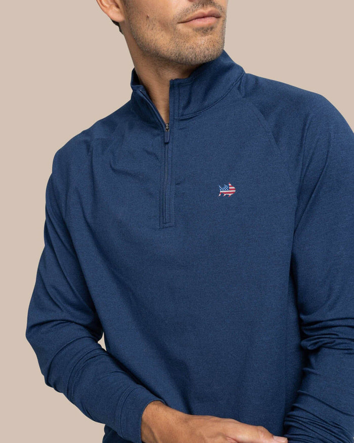 The detail view of the Southern Tide USA Flag Skipjack Cruiser Heather Quarter Zip by Southern Tide - Heather Dress Blue