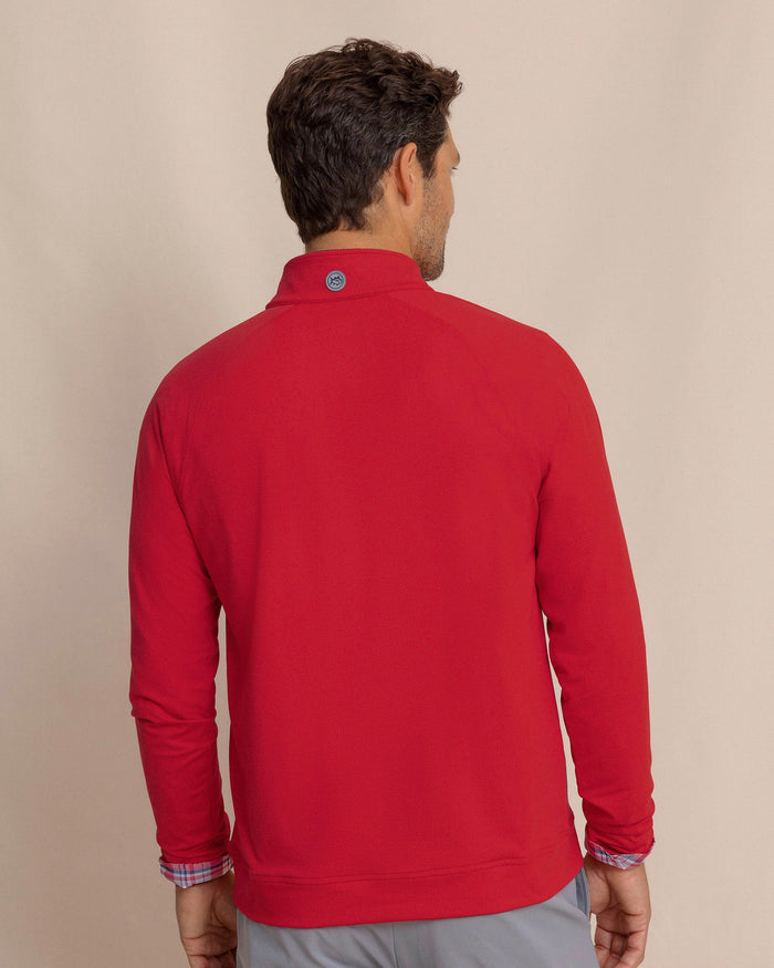 The back view of the Southern Tide USA Flag Skipjack Cruiser Heather Quarter Zip by Southern Tide - Heather Crab Red