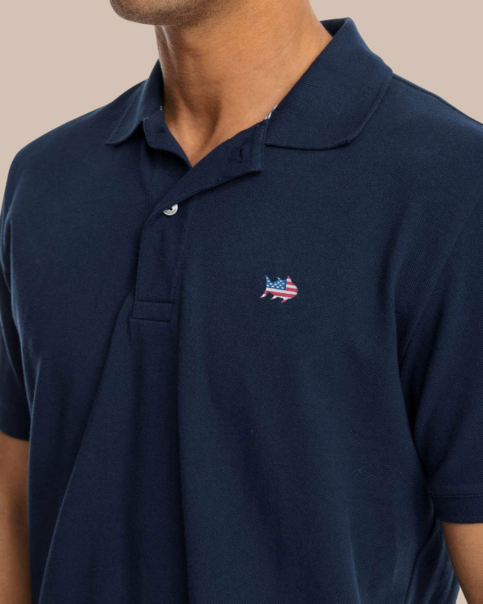 The detail view of the Southern Tide USA Flag Skipjack Polo by Southern Tide - Navy