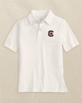 The front view of the Southern Tide USC Gamecocks Boys Driver Polo Shirt by Southern Tide - Classic White