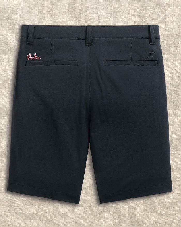 The back view of the Southern Tide USC Gamecocks Carolina Script brrr°®-die 8" Performance Short by Southern Tide - Caviar Black