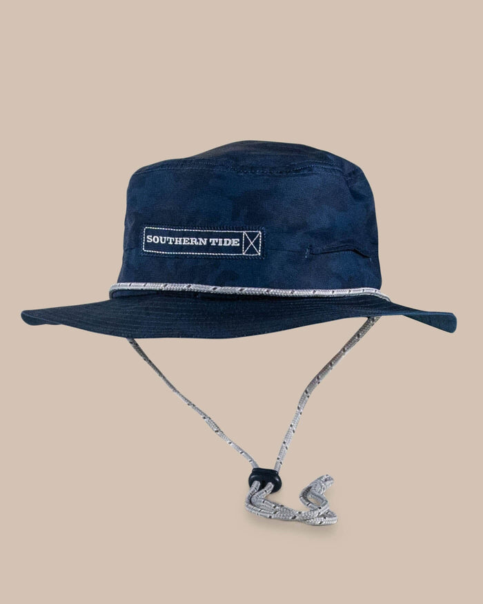 The front view of the Southern Tide Waterway Camo Print Performance Sun Hat by Southern Tide - True Navy