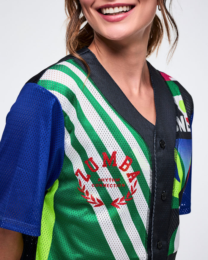 Close-up of the right side showing a Zumba logo in red and showing the mesh and buttons against a white background.