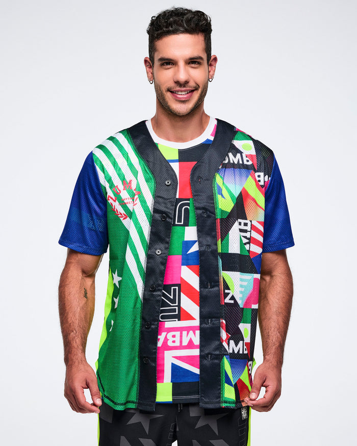 Male model wearing a colorful, patterned shirt with a white background.