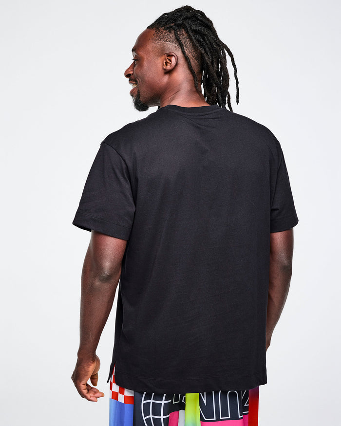 Back view of a male model wearing a black t-shirt on a white background.