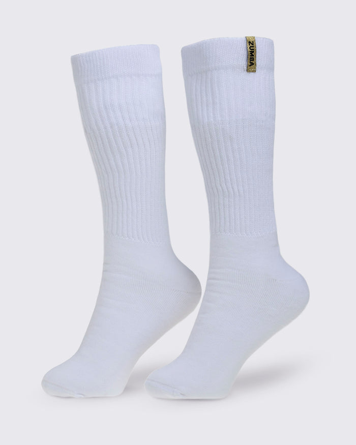 Pair of white socks with a gold Zumba logo on a white background.