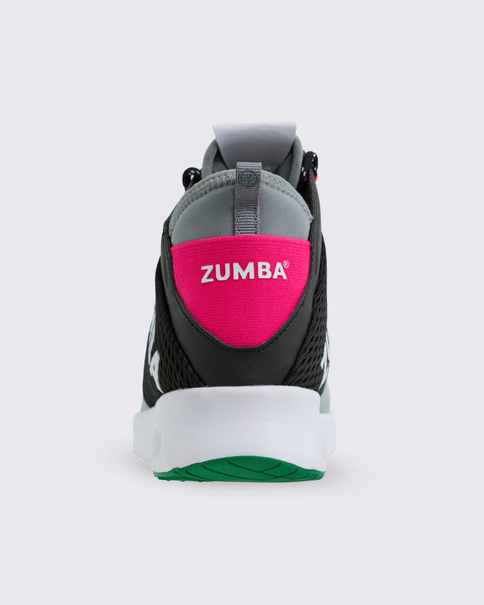 Back view of the black Zumba shoe with pink heel tab on a white background.