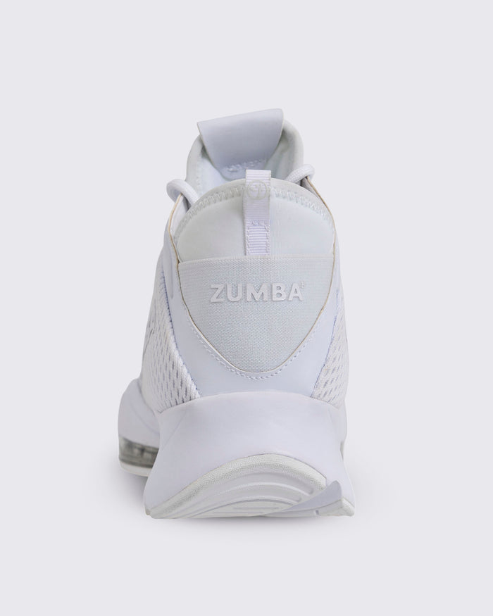 White Zumba high-top athletic sneaker shown from the back, featuring a breathable mesh upper, pull tab, padded heel, and a sculpted sole.