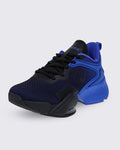 Front three-quarter view of blue-and-black Zumba sneaker with knit upper and sculpted midsole.