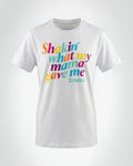 White short-sleeve Zumba Wear Juniors T-shirt with multicolor “Shakin’ what my mama gave me” text and aqua “ZUMBA” printed on the front. Crewneck tee shown on a plain light gray background.