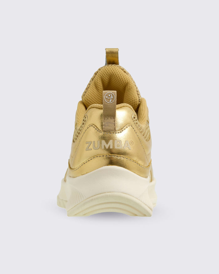 Back view of the gold Zumba sneaker on a white background.